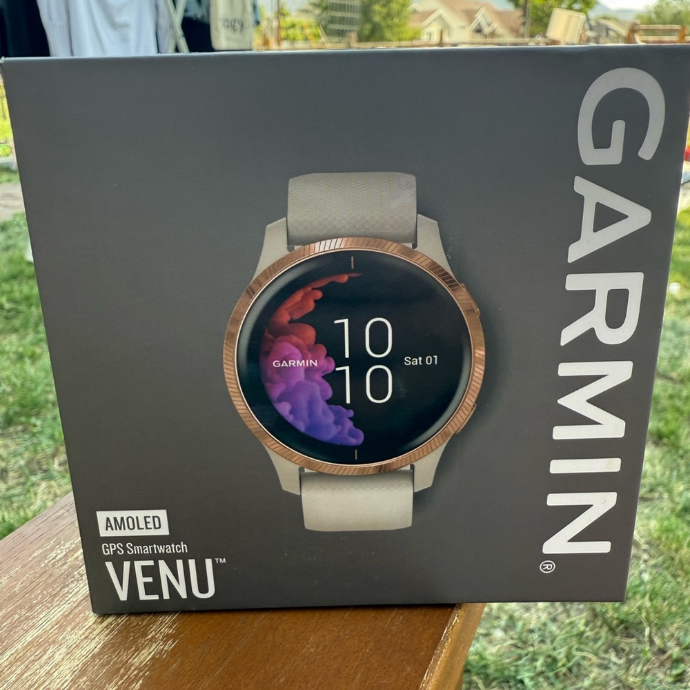 Garmin Venu Smartwatch with Rose Gold Bezel and Cream Band